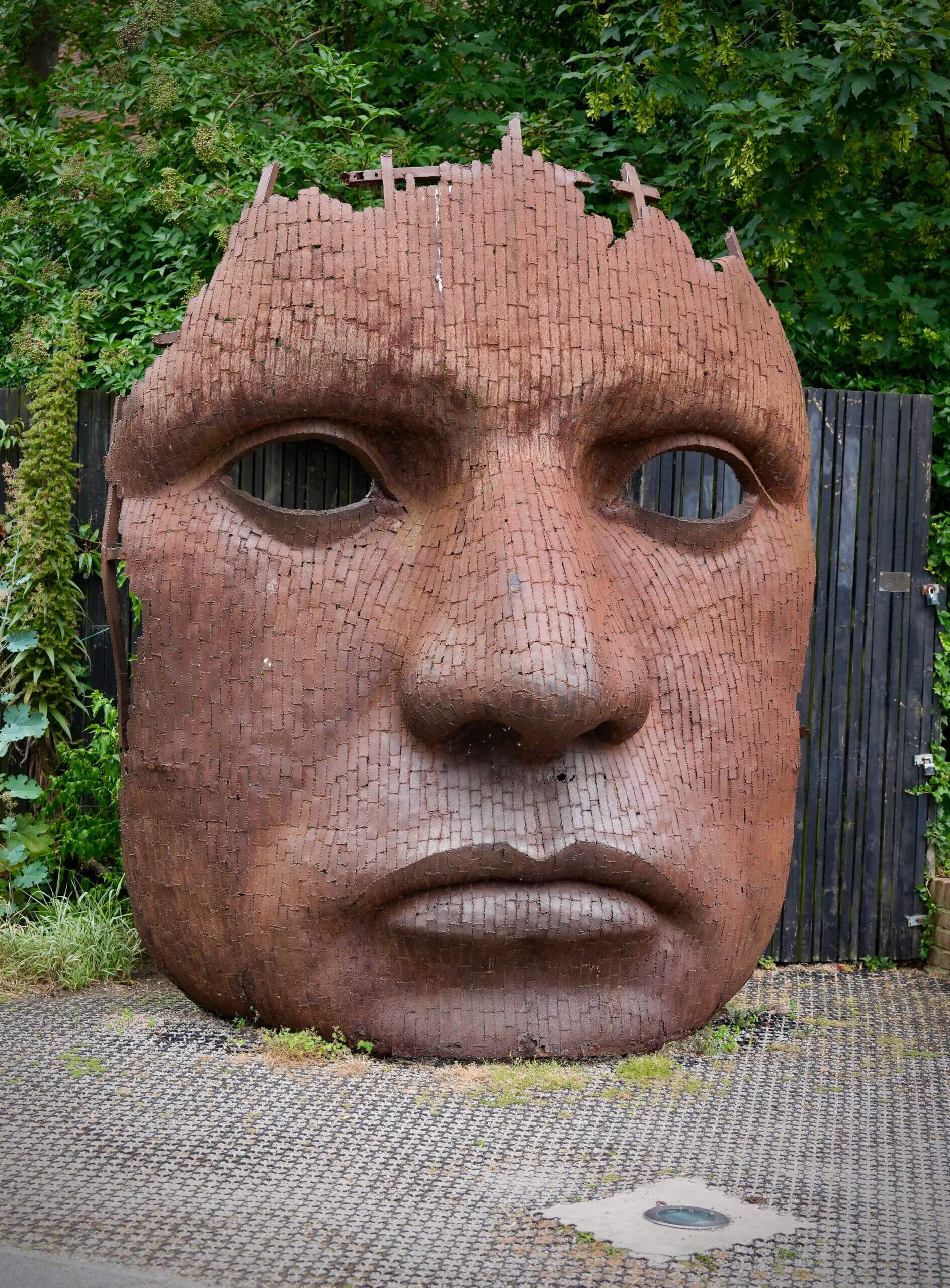 Bulkhead sculpture by Rick Kirby outside the Marlowe Theatre in Canterbury, symbolising the idea of emotional masking in young people.